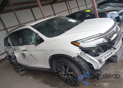 2019 Honda Pilot Touring z USA, uszkodzony, nr VIN 5FNYF5H6XKB037214